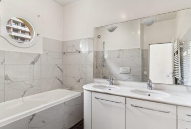 Co-exclusive listing – An exceptional apartment with a private garden